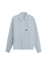 Blue and white striped shirt with a small black design on a white background